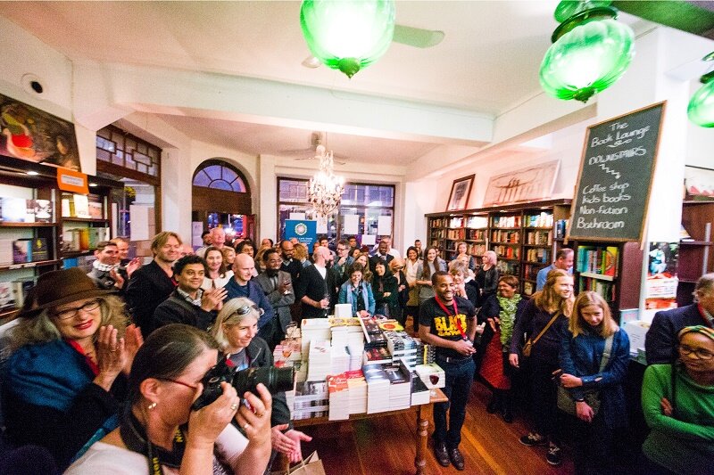 A full audience enjoys an Open Book Festival event at The Book Lounge Photographer - Retha Ferguson